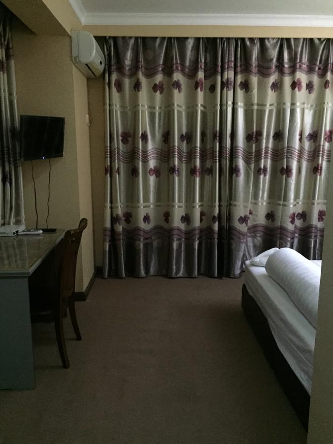 New Yuetan Hotel Darüsselam Dış mekan fotoğraf