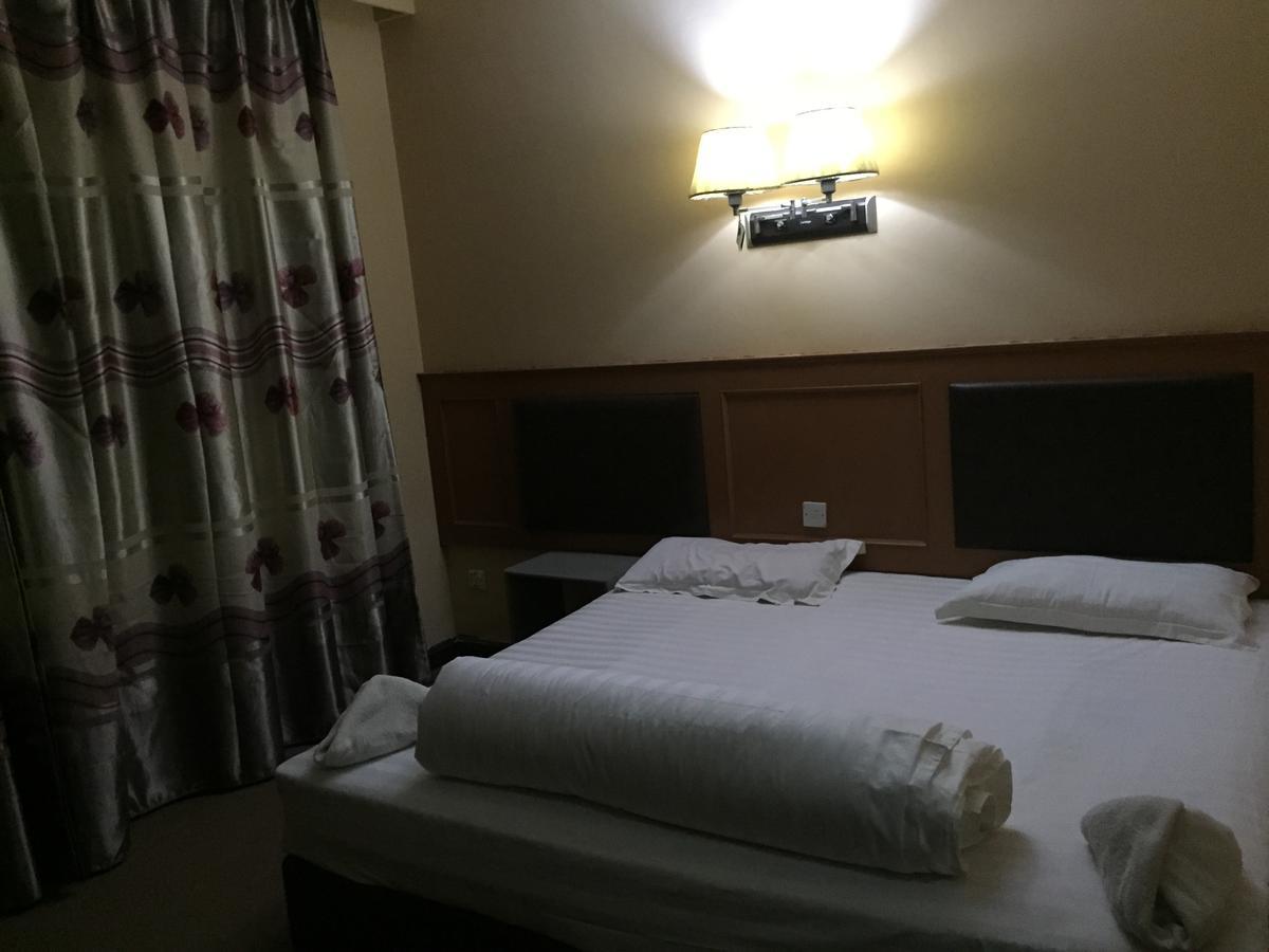 New Yuetan Hotel Darüsselam Dış mekan fotoğraf